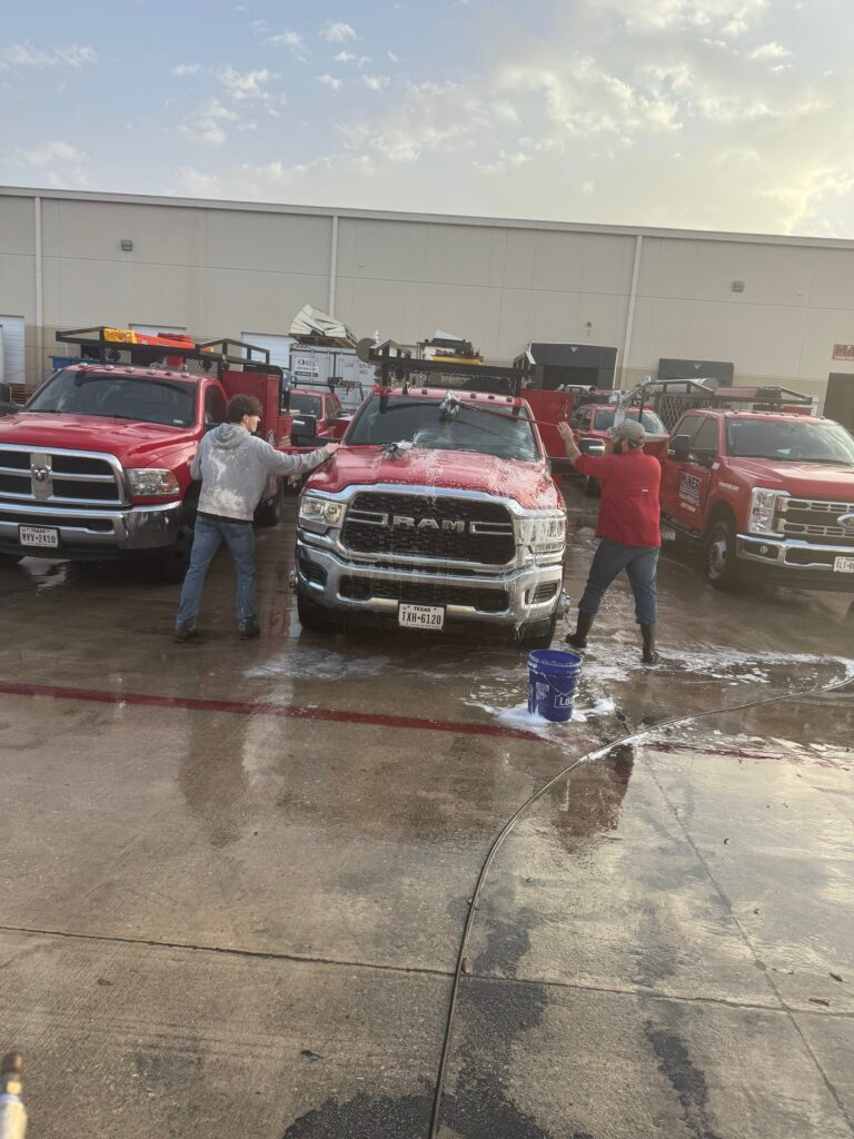 The Service Being Done Is Washing The Exterior Of Vehicles With Soap And Water Using Buckets And Hoses