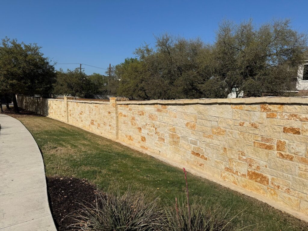 The Service Being Done Involves Pressure Washing The Stone Wall To Remove Dirt And Enhance Its Appearance