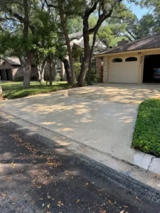 The Service Being Done Is Pressure Washing The Concrete Surface Of The Driveway To Remove Dirt And Debris