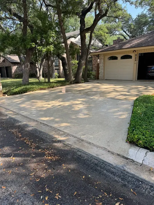 The Service Being Done Is Pressure Washing The Concrete Surface Of The Driveway To Remove Dirt And Debris