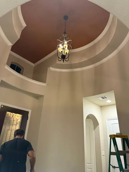 The Service Being Done Is Cleaning The Walls And Ceiling In The Entryway Of The Home